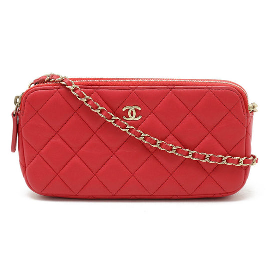 Chanel Women's Red Leather Clutch Bag with Shoulder Strap in Red