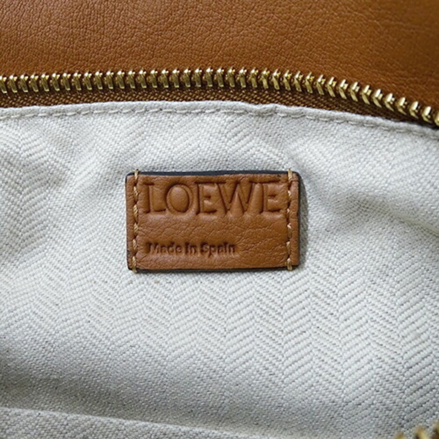Loewe Women's Versatile Leather Handbag with Unique Design in Brown