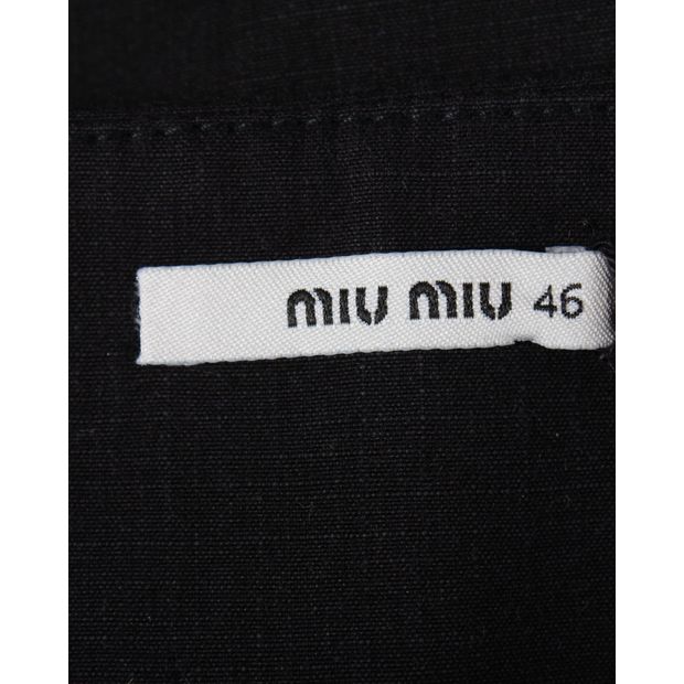 Miu Miu Skater-Style Mini Skirt in Black Cotton