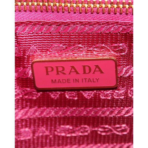 Prada Logo Plaque Clutch Bag in Pink Saffiano Leather