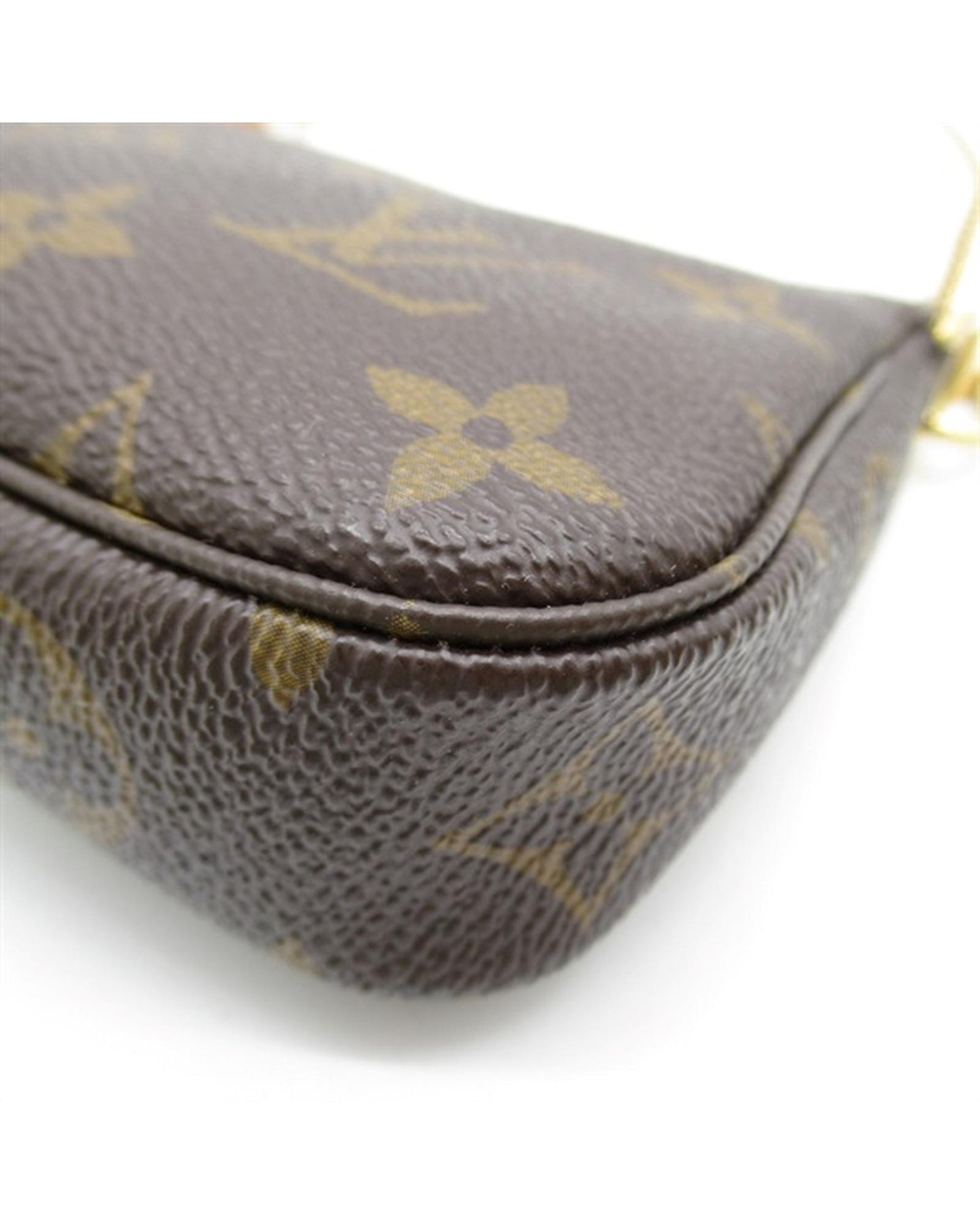 Louis Vuitton Women's Mini Monogram Brown Pochette Bag in Brown