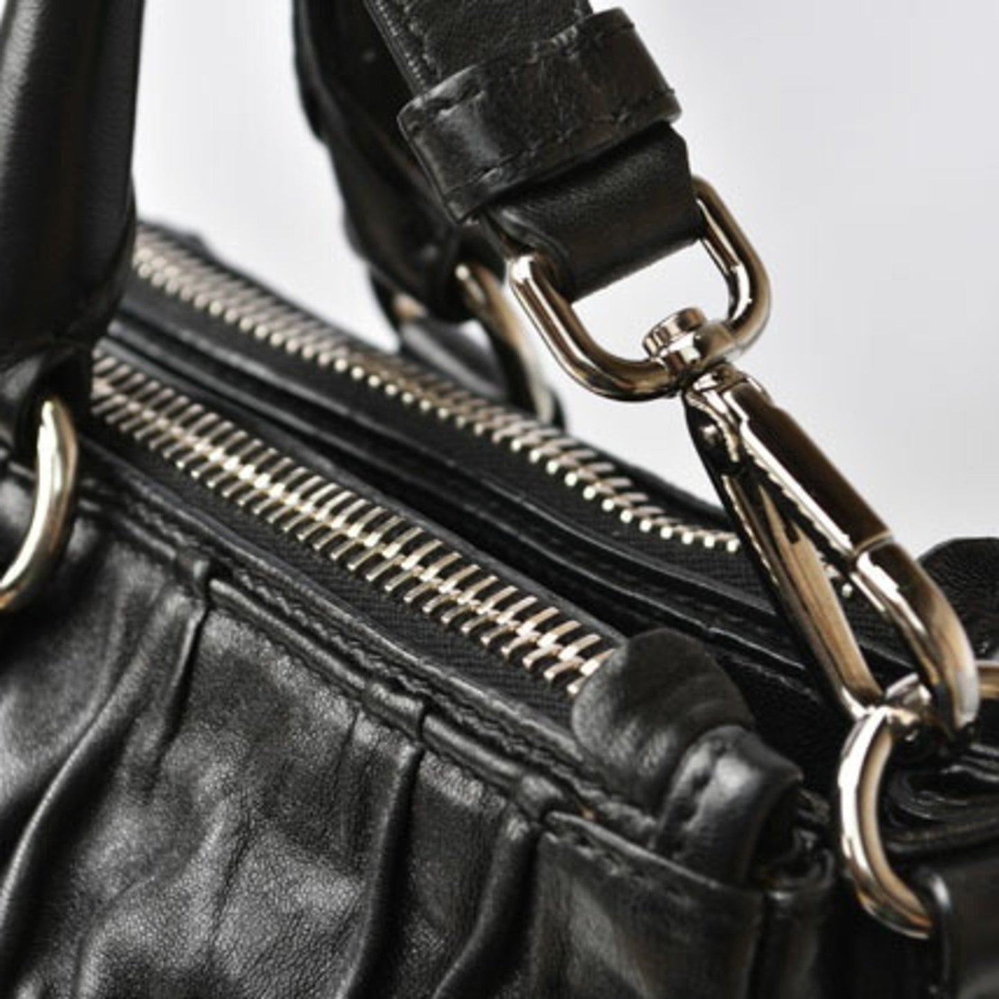 Prada Women's Embossed Leather Shoulder Bag in Black