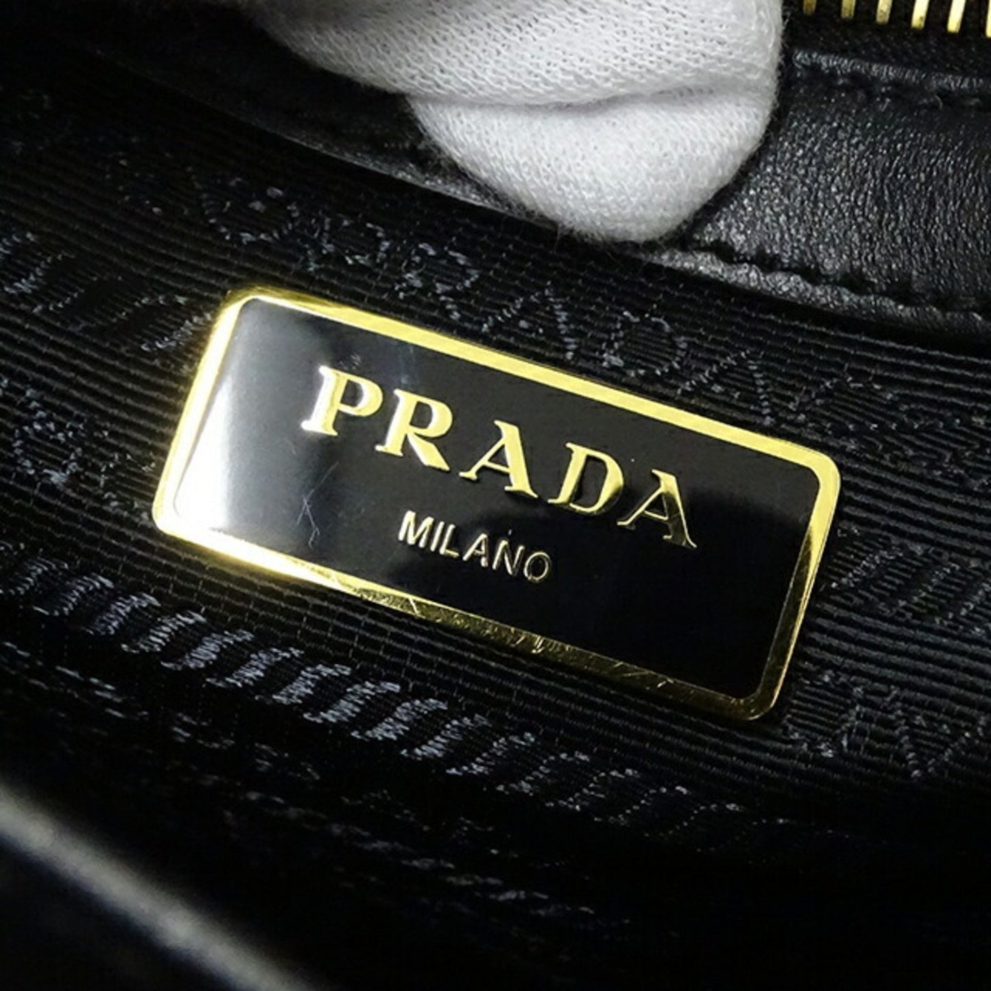 Prada Women's Black Leather Cross-Body Handbag with Clochette and Shoulder Strap in Black