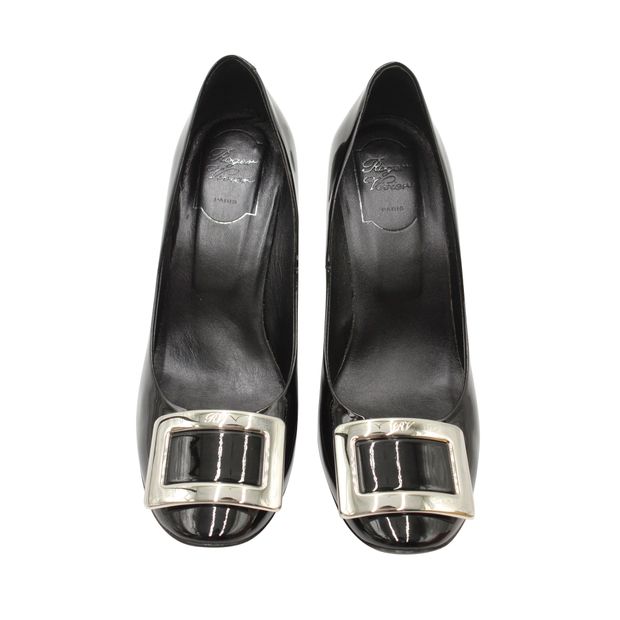 Trompette Metal Buckle Pumps in Black Patent Leather