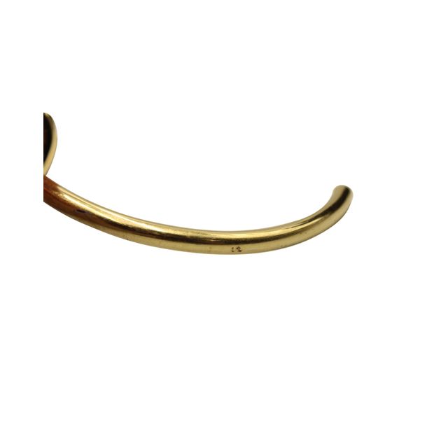 CÃ©line Open Knot Bracelet in Gold Metal
